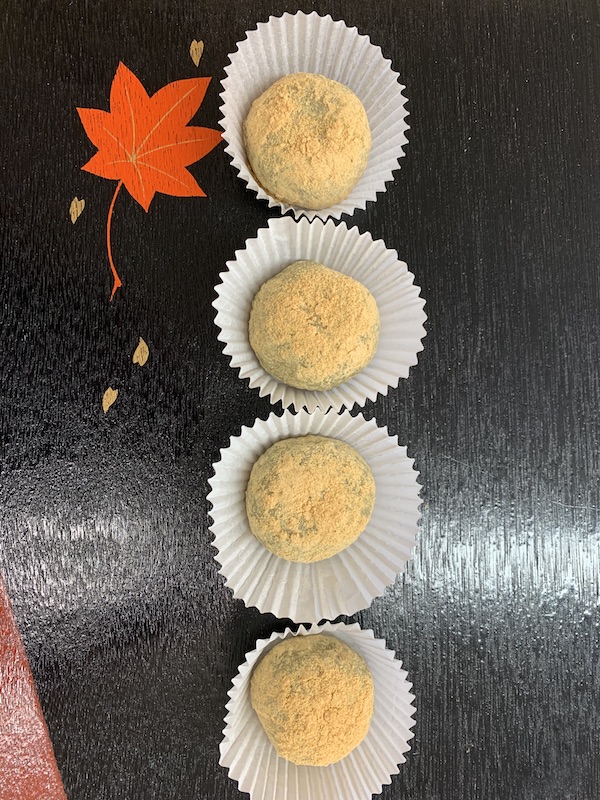 Uguisu - Smooth red bean paste, covered with sweet Gyuhi mochi, and then dusted with Kinako (roasted soybean) powder. a traditional favorite.